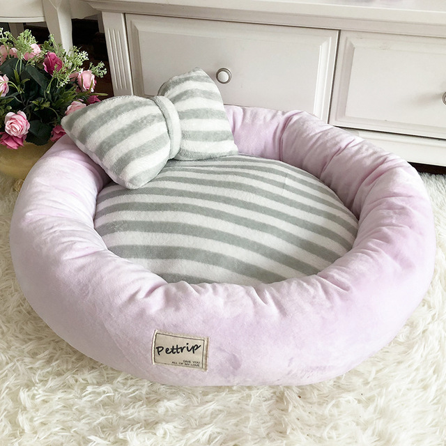 Cama acolchada para perro y gato con almohada en forma de lazo, color rosa,  vista completa
