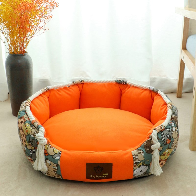 Cama acolchada redonda color naranja para mascota extraíble