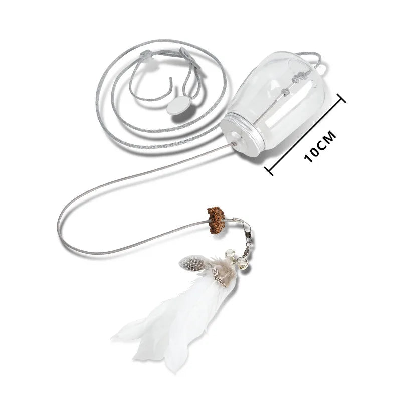 Juguete interactivo para gatos con plumas, cascabel, dispensador de comida, cuerda para rascar y comedero automático. Incluye hierba gatera.