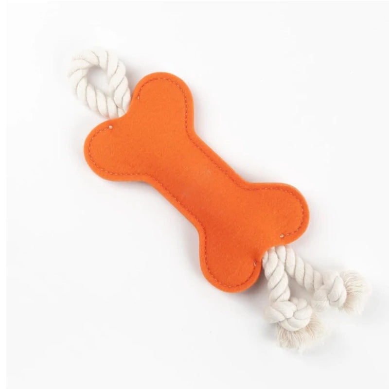 Juguete con forma de hueso de fieltro para perro color naranja